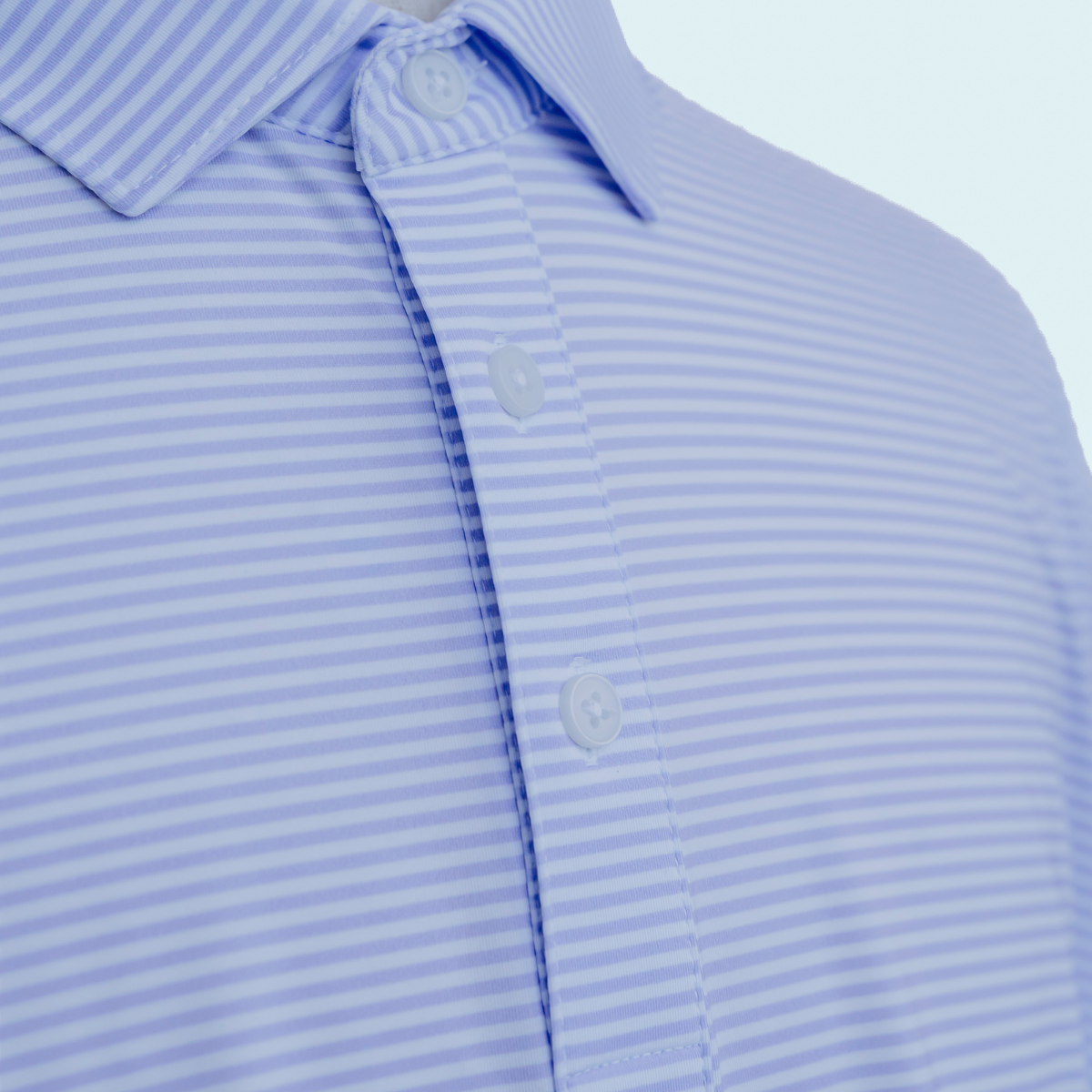 Close-up detail of the Palmetto Clothing The Classic Stripe Polo in Lavender showcasing the premium fabric, soft hand feel, and craftsmanship that define timeless golf attire.