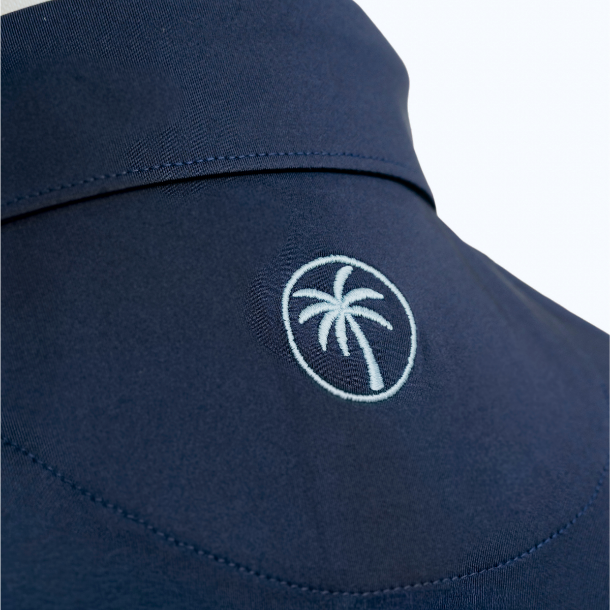 Back view of the Palmetto Clothing The Wayne Polo in Navy highlighting its modern fit, breathable construction, and premium comfort for golf and everyday wear.