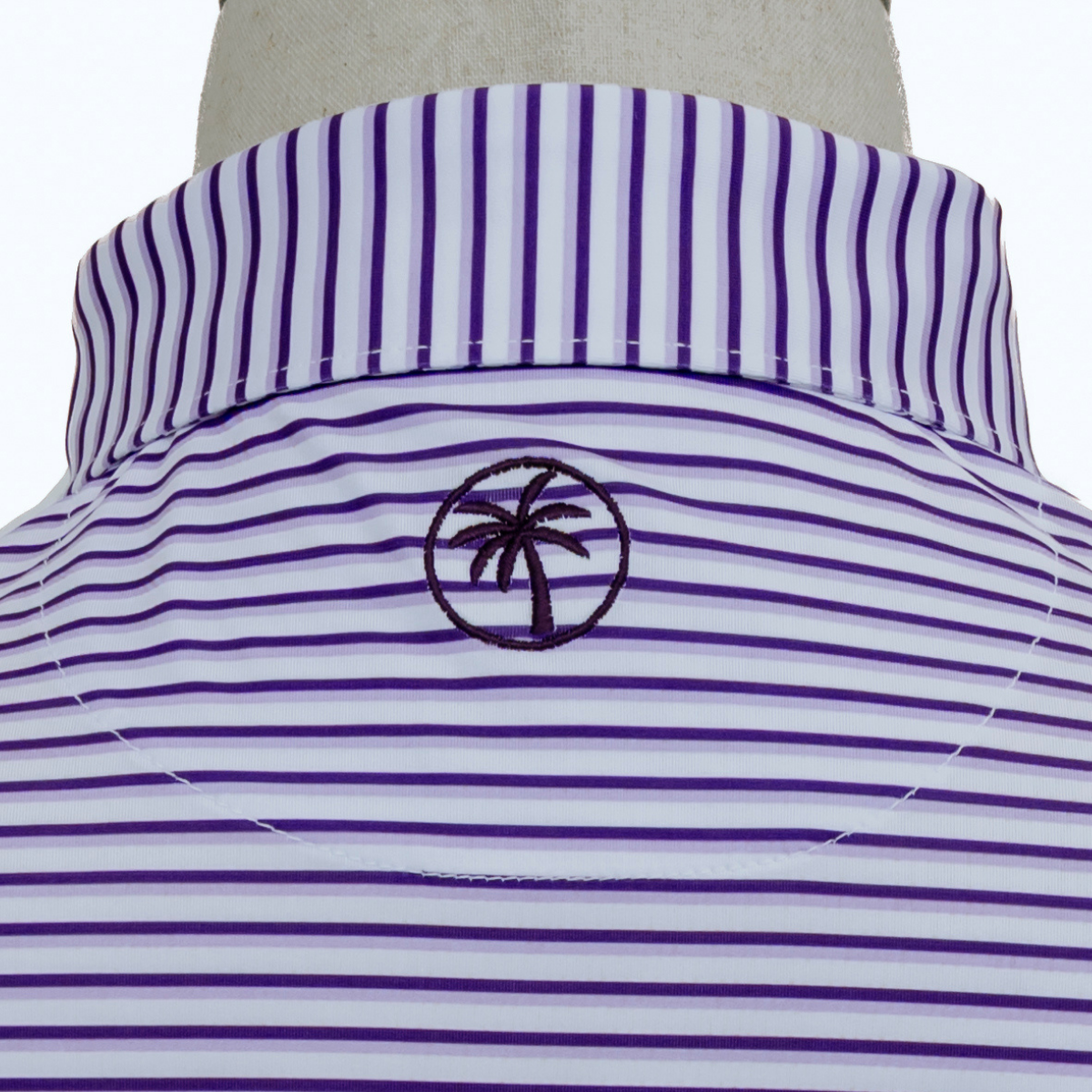 Back view of the Palmetto Clothing The Double Double Polo in Purple highlighting the athletic fit, breathable construction, and lightweight performance fabric designed for golf and everyday wear.