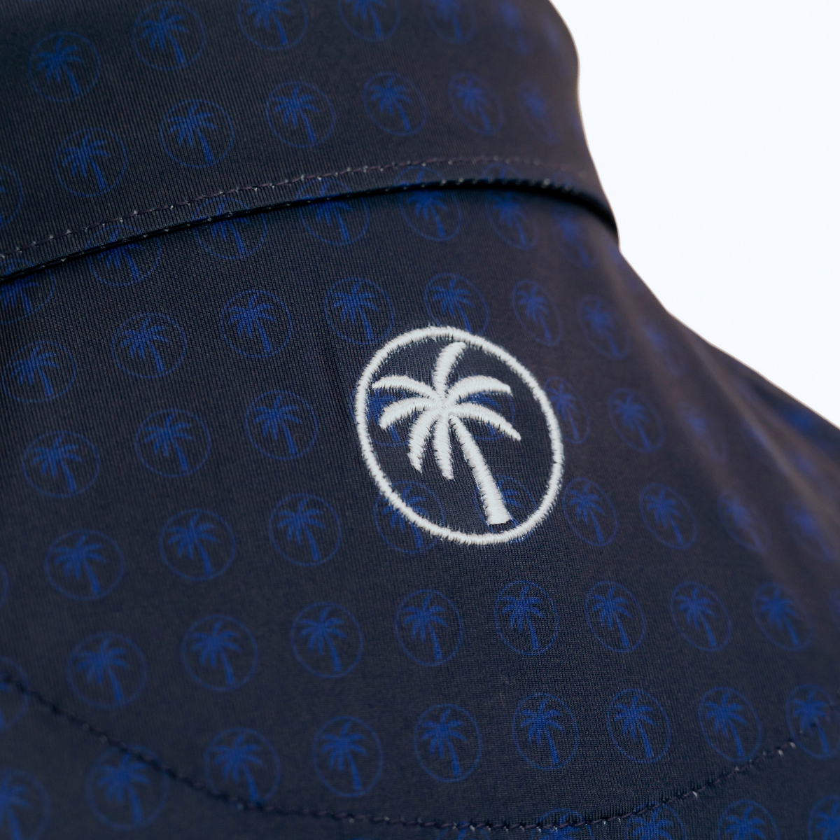 Back view of the Palmetto Clothing The Icon Polo in Navy and Blue highlighting the athletic fit, breathable performance fabric, and premium construction designed for golfers who demand comfort.