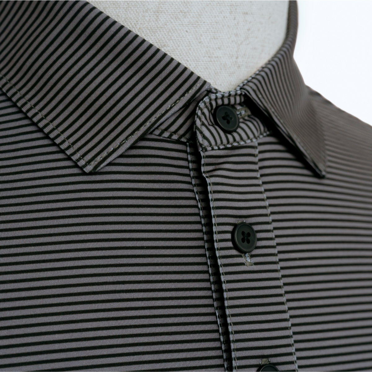 Close-up product detail of the Palmetto Clothing The Micro Polo showcasing the premium fabric, subtle repeating stripe pattern, refined stitching, and craftsmanship behind this modern golf top with timeless style and exceptional comfort.