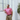 Model wearing the Palmetto Clothing The Shots Polo in Bright Pink featuring a repeating white shot glass pattern. One of our premium golf shirts for men built with lightweight performance fabric and exceptional comfort for golfers who enjoy bringing personality to every round.