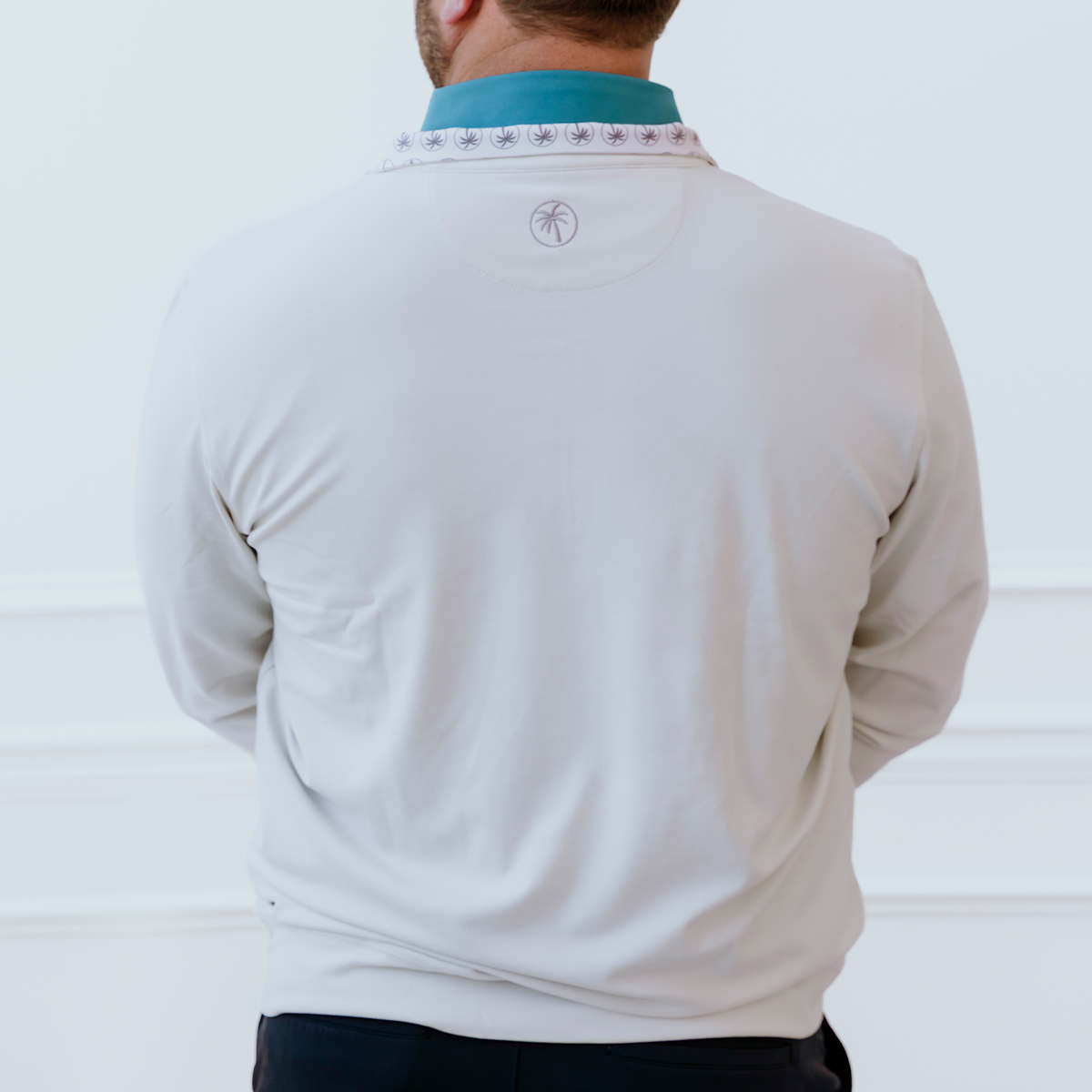 Back view of the Palmetto Clothing Light Gray Thomas golf quarter-zip showcasing a clean athletic fit designed for golfers who value premium performance apparel.