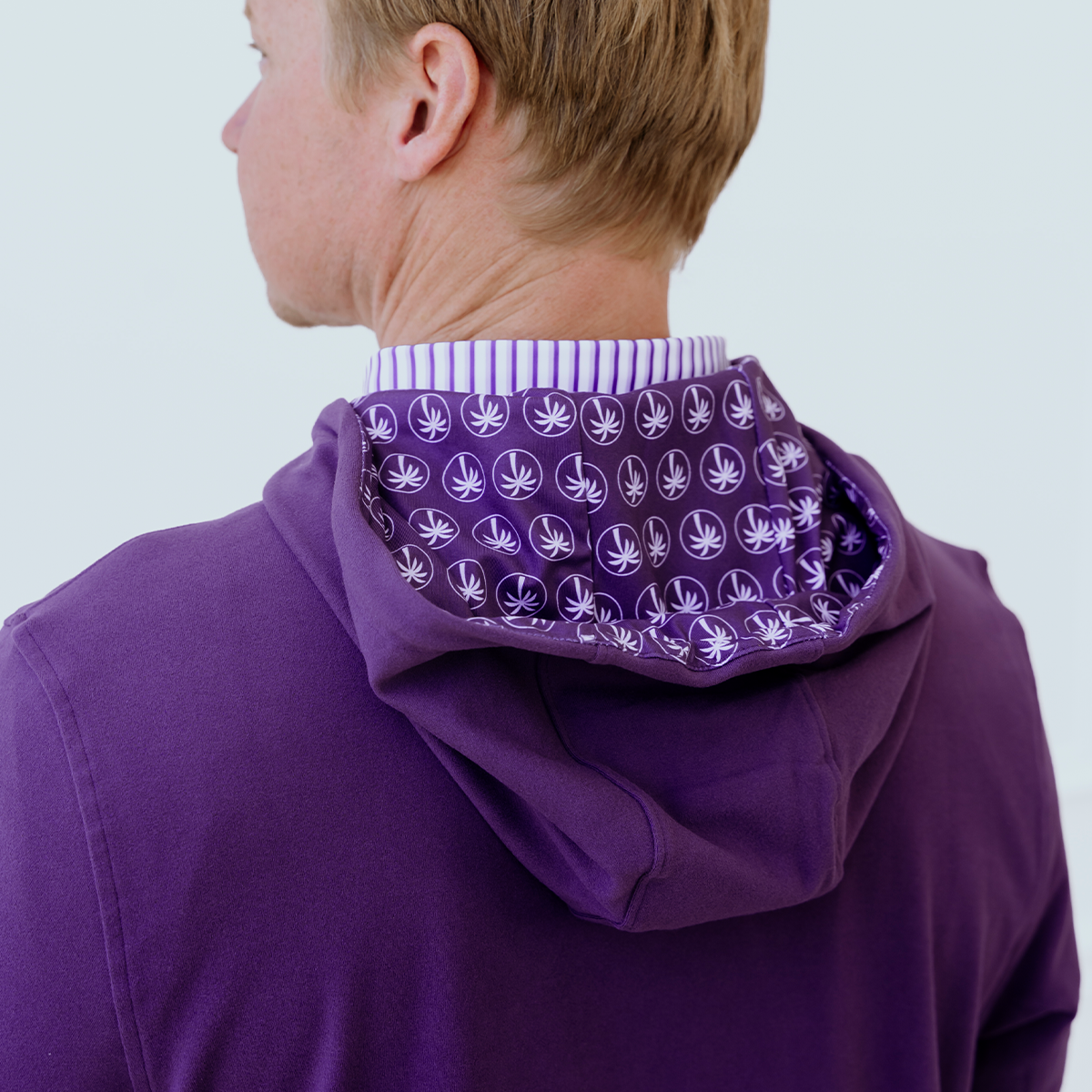 Back view of the Deep Purple golf hoodie highlighting premium craftsmanship, clean styling, and lightweight comfort for every round.