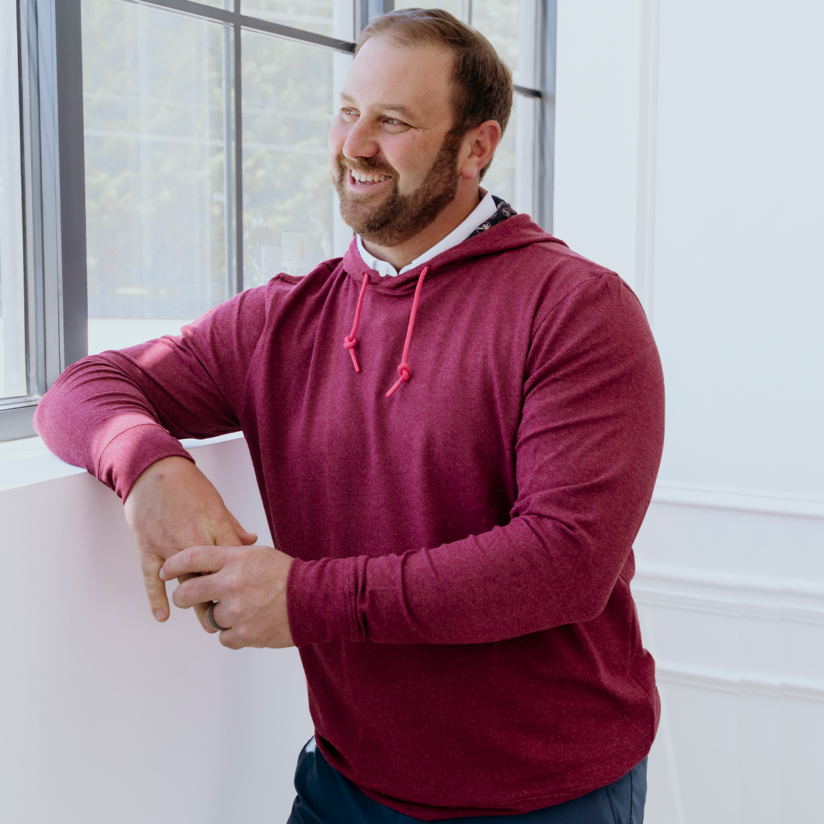 The Garnet Palmetto men's golf hoodie combines rich color with premium comfort, delivering an ultra-soft layer designed for golfers who value everyday versatility.